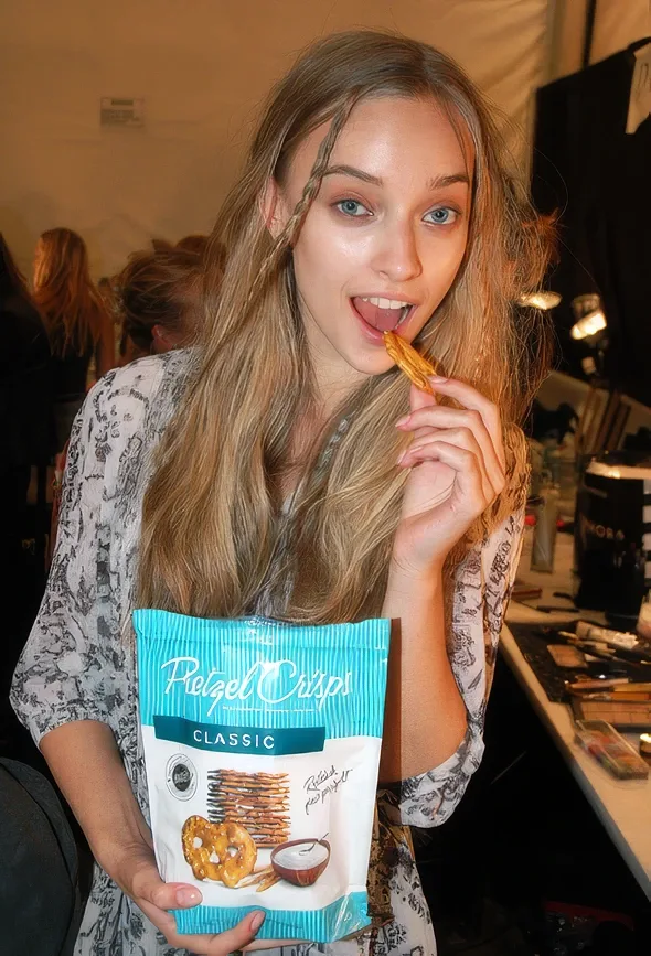 Model snacking on Pretzel Crisps backstage at New York Fashion Week