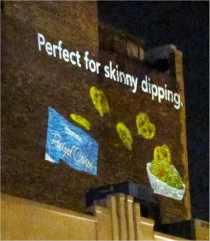 Pretzel Crisps ‘Perfect for skinny dipping’ building projection at New York Fashion Week